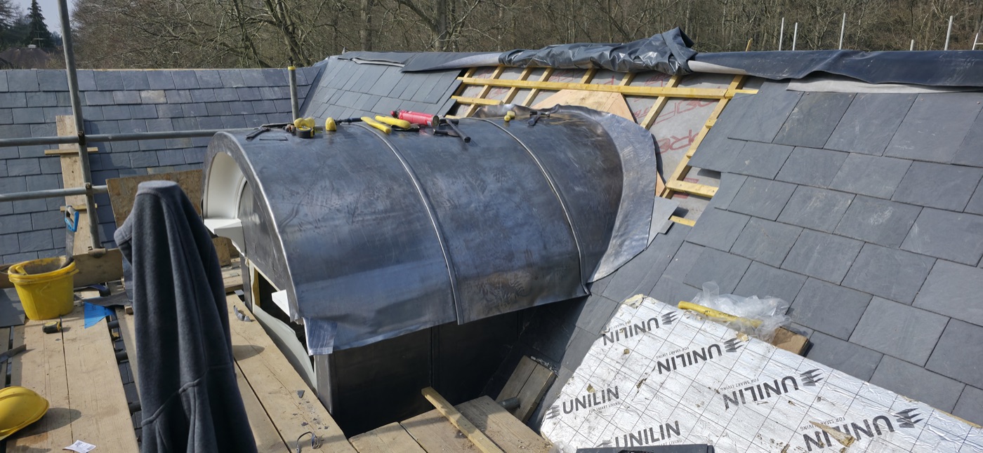 Bespoke lead dome dormer on natural slate roof
