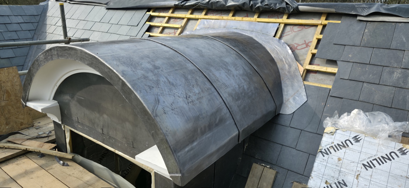 Completed lead dome with natural slate surrounds