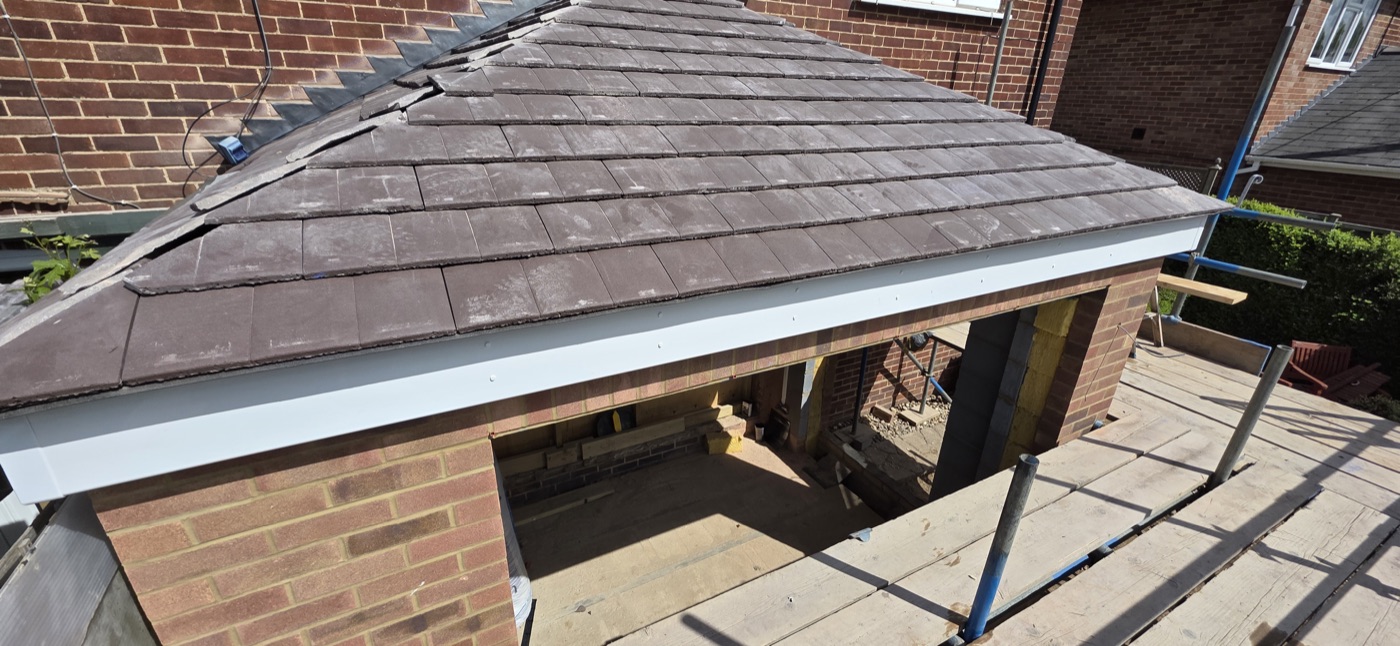 Concrete tile extension hip roof from above