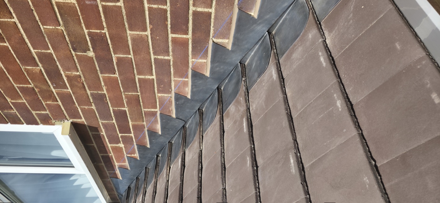 Lead soaker flashing on new concrete tile
