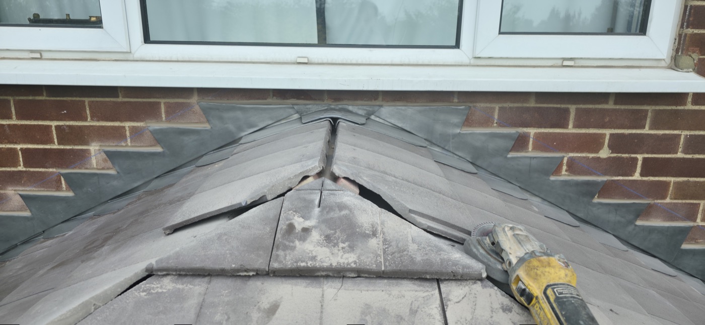 Lead bay roof installation in progress