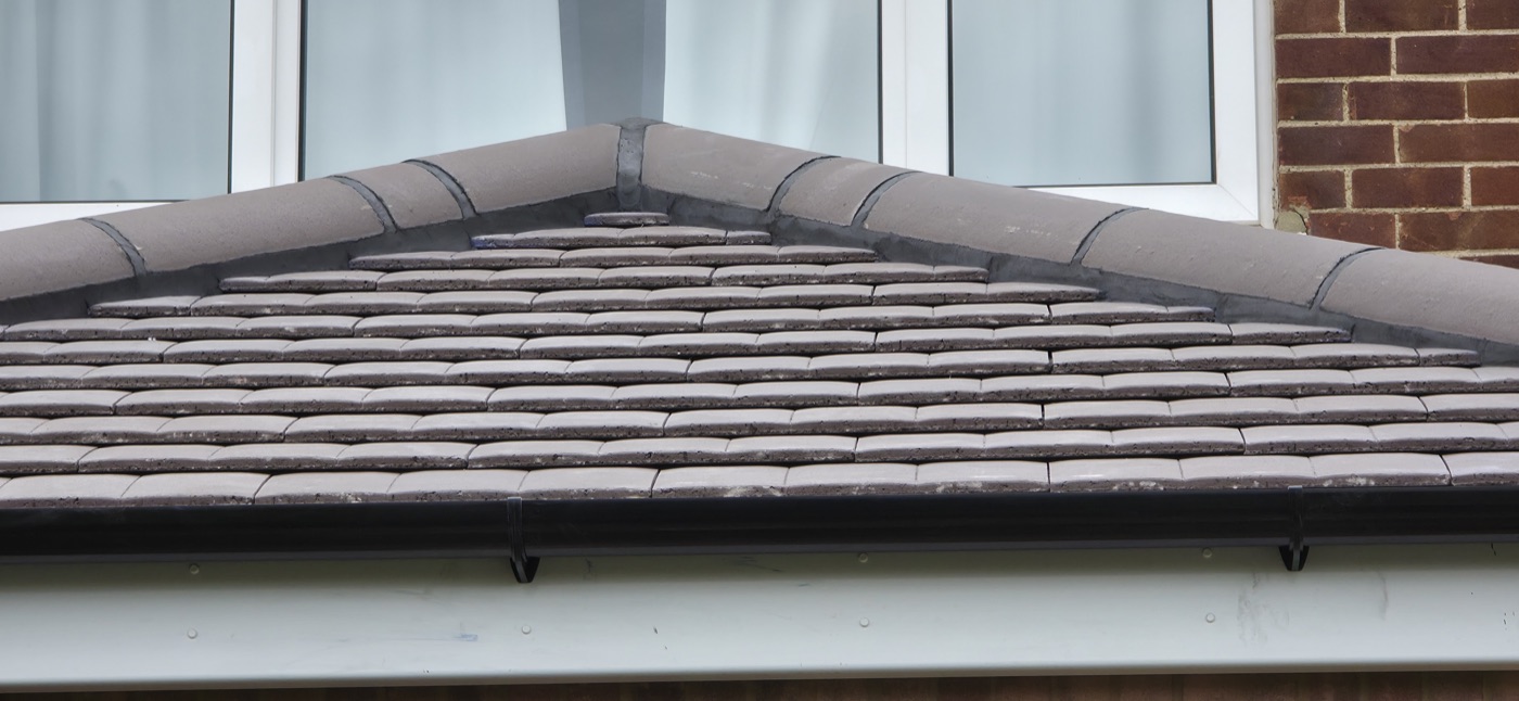 Concrete tile ridge detail close up