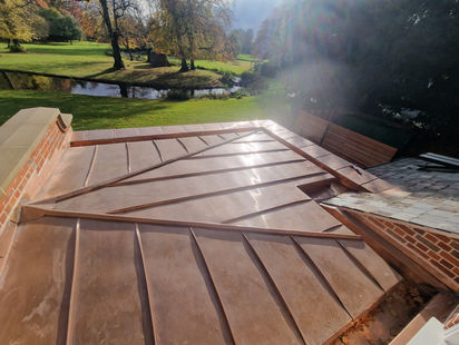 Copper flat roof on country estate with parkland