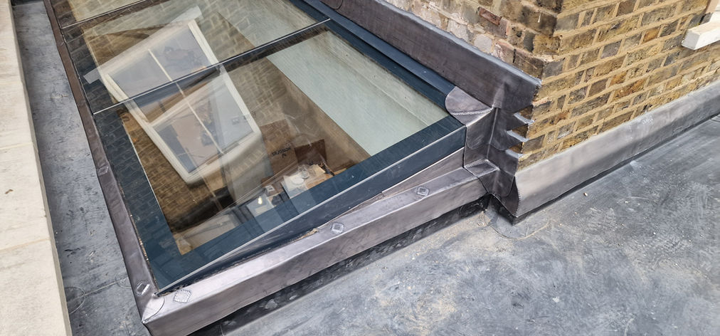 Lead-dressed rooflight on flat roof