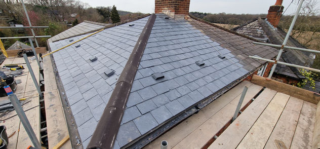 Natural slate roof replacement aerial view